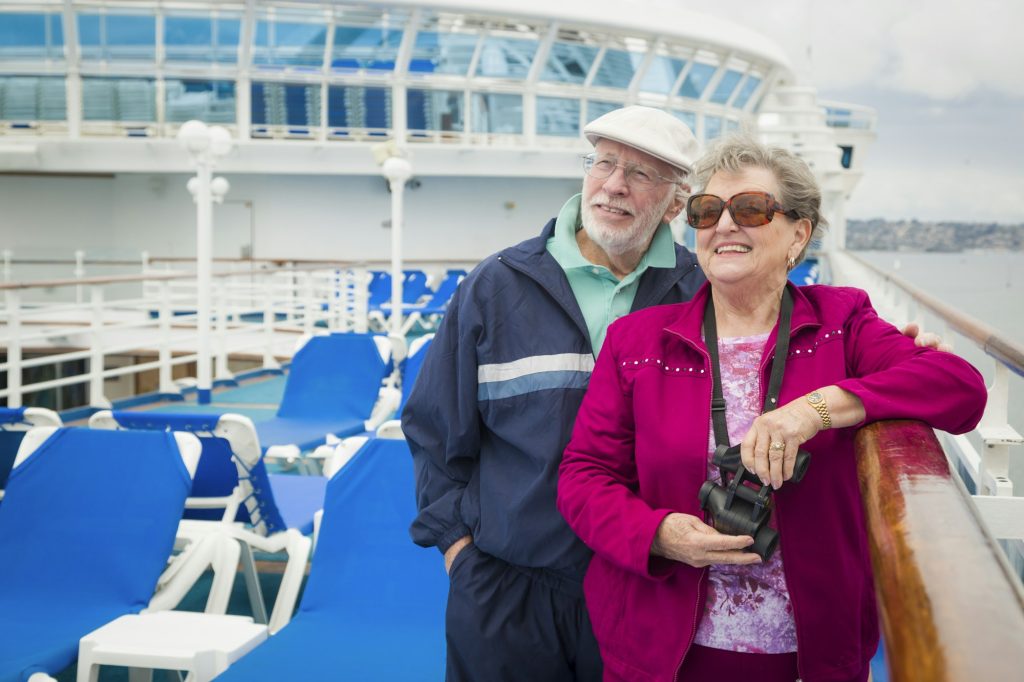 Senior Couple Enjoying The Deck of a Cruise Ship