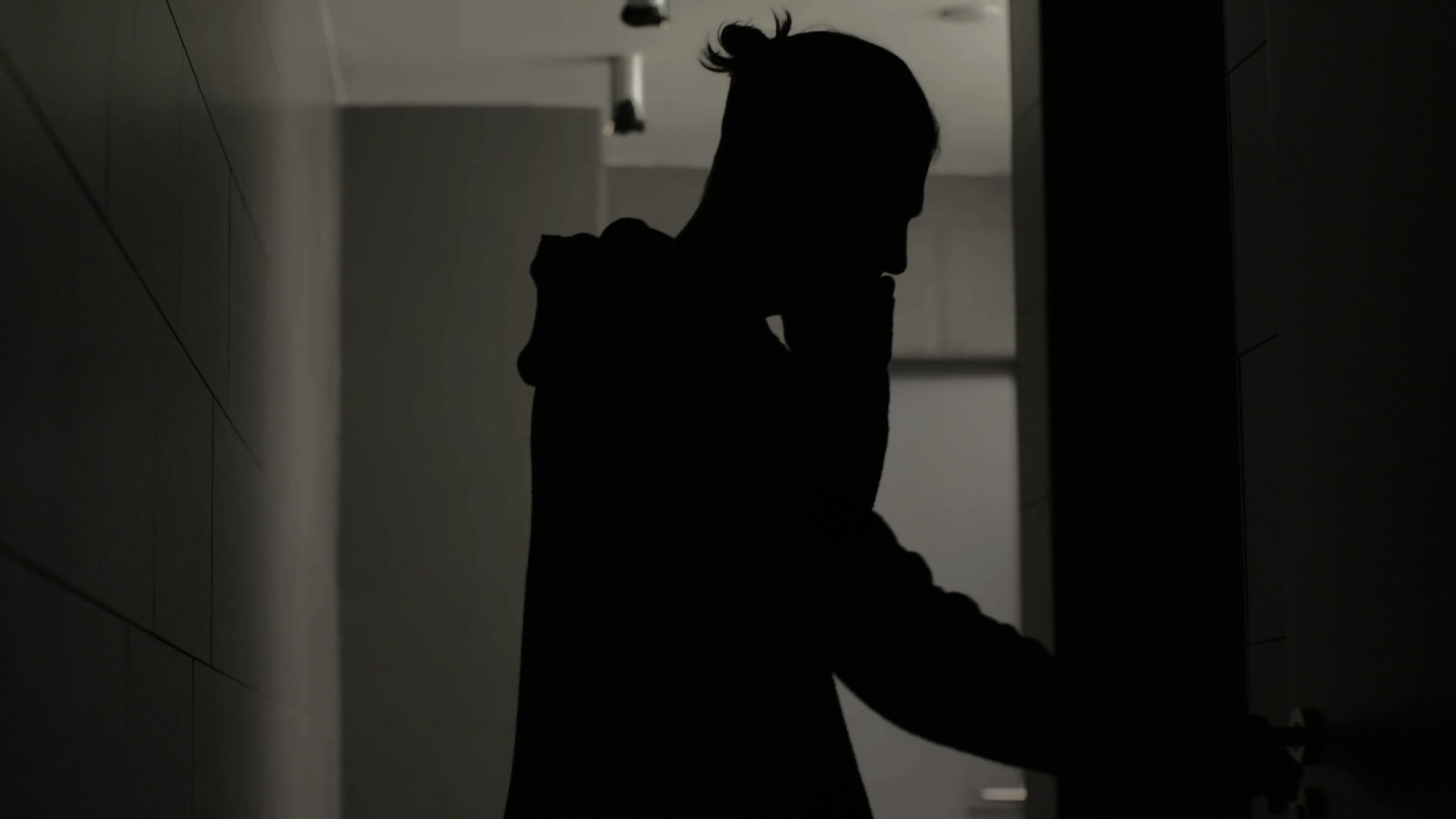 teacher standing outside a classroom